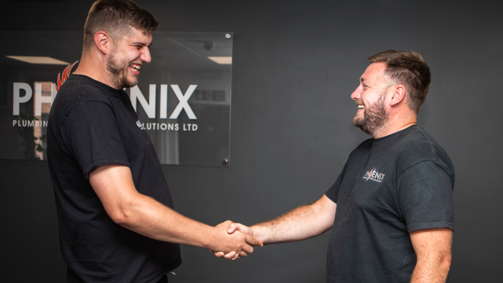 Karl Cowell of The Build Agency shaking Hands with Dean Fincham of Phoenix Mechanical Servcies